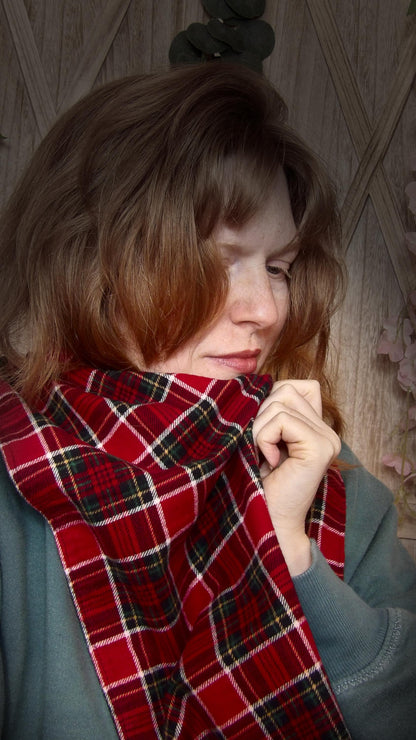 Model wearing red tartan flannel scarf made of 100% cotton. Soft, warm cotton fleece with a royal stewart inspired plaid design. Handmade in Washington State, USA