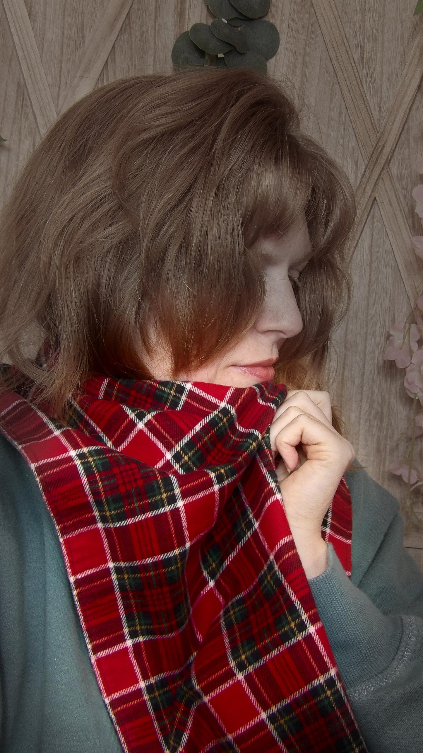 Model wearing red tartan flannel scarf made of 100% cotton. Soft, warm cotton fleece with a royal stewart inspired plaid design. Handmade in Washington State, USA